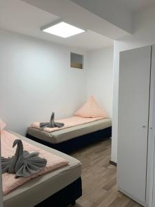 Katil atau katil-katil dalam bilik di Zentrale WG in lebendigem Viertel!
