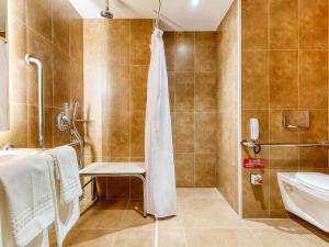 Um banheiro em Novotel BH Savassi