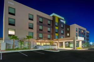 a hotel with a parking lot in front of it at Home2 Suites By Hilton Las Vegas North in Las Vegas