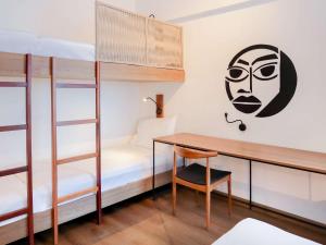 Postel nebo postele na pokoji v ubytování ibis Styles Maceió Pajuçara