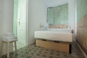 A bed or beds in a room at yök Casa Cultura