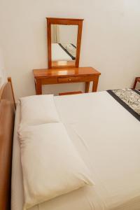 Postel nebo postele na pokoji v ubytování Hotel Las Palmas Cancun Centro