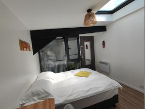 Cama o camas de una habitación en COLIVING FLORALE