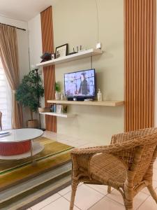 TV a/nebo společenská místnost v ubytování D'Houzz