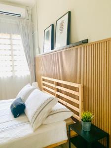 Postel nebo postele na pokoji v ubytování D'Houzz