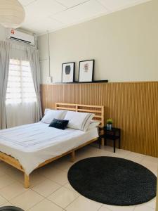 Postel nebo postele na pokoji v ubytování D'Houzz