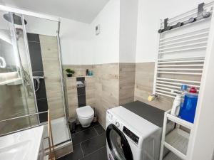 Et badeværelse på Familienurlaub am Meer & Wellness in der Nähe + 12 billeder