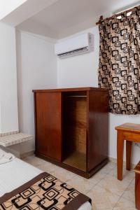 Postel nebo postele na pokoji v ubytování Hotel Las Palmas Cancun Centro