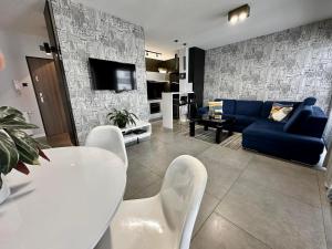 Posedenie v ubytovaní LuxApart Kalisz