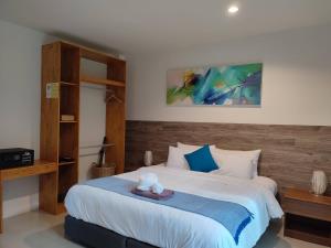 Postel nebo postele na pokoji v ubytování Phangan Akuna + 9 fotografií