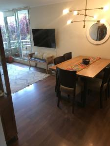 TV a/nebo společenská místnost v ubytování Apartamento Full