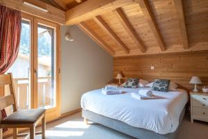 Кровать или кровати в номере Chalet Talini