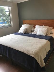 Postel nebo postele na pokoji v ubytování Apartamento Full