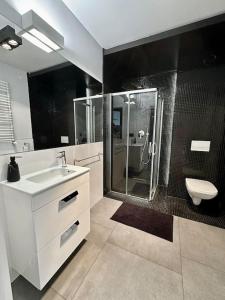 Kúpeľňa v ubytovaní LuxApart Kalisz