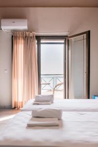 Ένα ή περισσότερα κρεβάτια σε δωμάτιο στο Abbey Resort