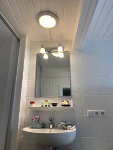 Phòng tắm tại Wellness am Wald Wellness Behandlungen & Frühstück Auszeit im Odenwald
