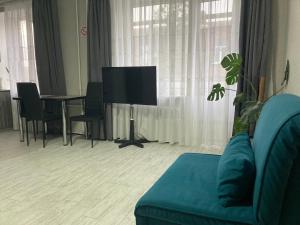 Μια τηλεόραση ή/και κέντρο ψυχαγωγίας στο Apartment Artynova 29