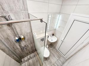 Phòng tắm tại Malavi TN2 top center apartment Ruse