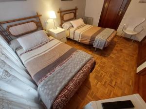 Postel nebo postele na pokoji v ubytování apartamento gran Vía