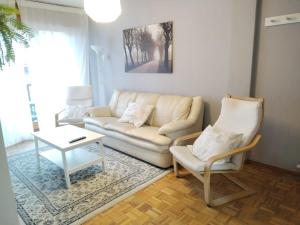 Posezení v ubytování apartamento gran Vía