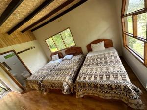 Postel nebo postele na pokoji v ubytování Lia B&B Lucmabamba
