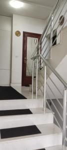 a staircase in a building with a stair case at Apartment in Prilep in Prilep