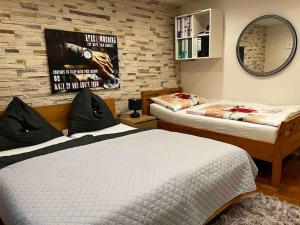 Un pat sau paturi într-o cameră la Apartment Reißeck