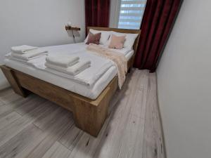 Posteľ alebo postele v izbe v ubytovaní Apartament w Śródmieściu