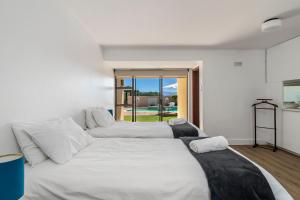 Postel nebo postele na pokoji v ubytování Sand Castle