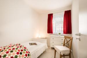 Llit o llits en una habitació de Auszeit am Südensee