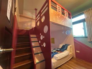 We Smile B&B tesisinde bir ranza yatağı veya ranza yatakları
