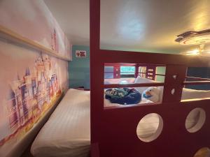 We Smile B&B tesisinde bir odada yatak veya yataklar