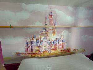 We Smile B&B tesisinde bir odada yatak veya yataklar