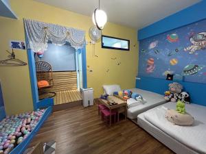 We Smile B&B tesisinde bir odada yatak veya yataklar