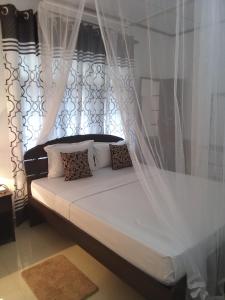 Letto o letti in una camera di Kavee Transit Hotel