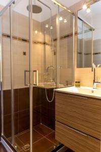 a bathroom with a shower and a sink at Sigal Villa in Akrotiri