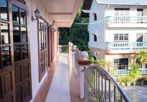 A balcony or terrace at G house guest house