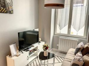 Телевизор и/или развлекательный центр в Le Florentin - Hyper centre