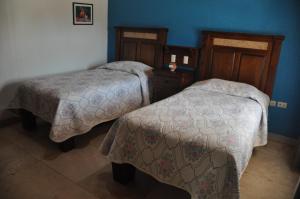 Postel nebo postele na pokoji v ubytování Hotel Ecológico Temazcal