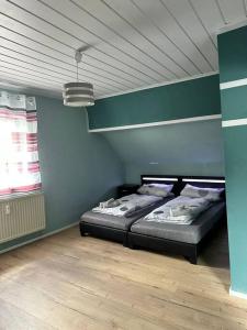 a bedroom with a bed in a room at Gemütliche Wohnung in Pforzheim in Pforzheim