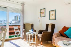 Posezení v ubytování Apartamento IRMASOL