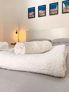 Cama o camas de una habitación en Le Vie del Borgo