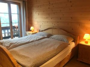 Postel nebo postele na pokoji v ubytování Chalet Ancienne Poste