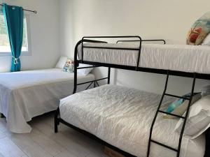 Postel nebo postele na pokoji v ubytování Villa CAS. nueva en Palma Real