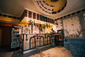 De lounge of bar bij Oazis