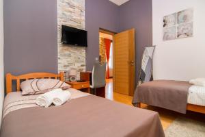 Postel nebo postele na pokoji v ubytování VisitZagreb Apartment