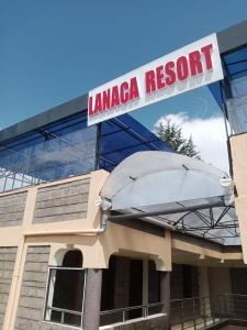 a library with a sign on top of a building at LANACA RESORT in Litein