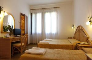 Postel nebo postele na pokoji v ubytování Hotel Villa Orio & Beatrice