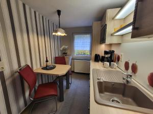 Nhà bếp/bếp nhỏ tại Ferienhaus Sonnenblick Schmilka