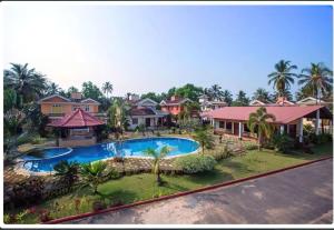 View ng pool sa Majorda Coastal Homestay o sa malapit